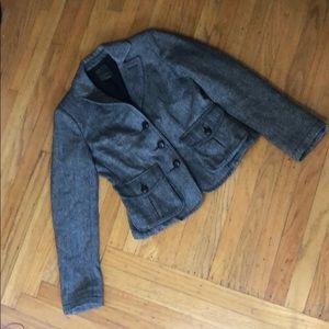 Lucky you, this adorable tweed jacket is for sale!